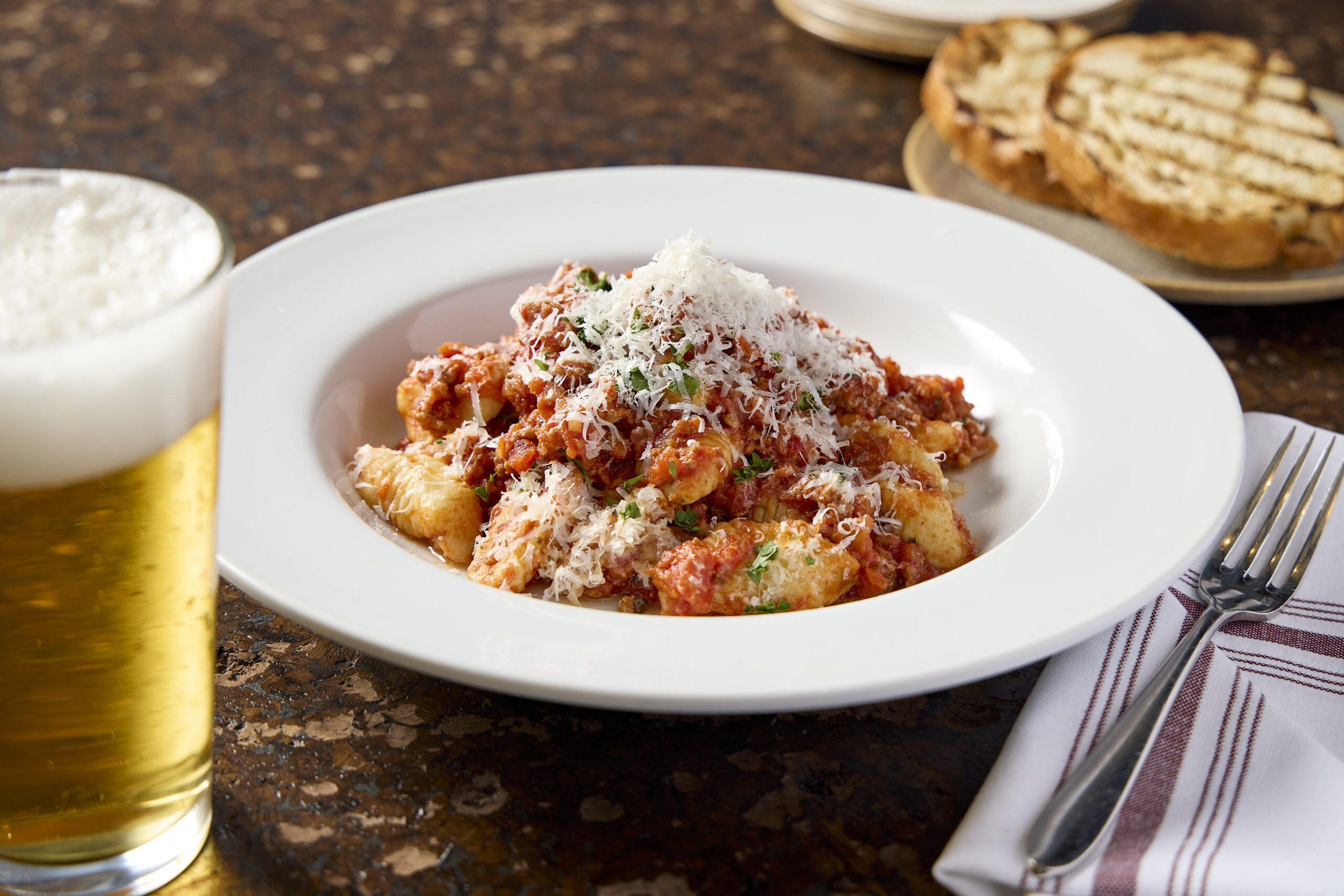 Housemade Potato Gnocchi with Bolognese Sauce | State and Lake Chicago Tavern